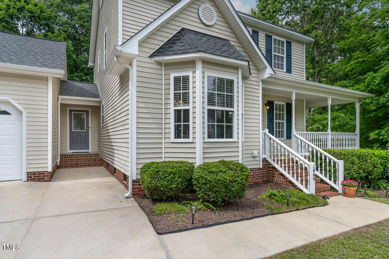 1060 Alderman Circle Raleigh, NC 27603 - Photo 2 of 30 a view of a house with a yard