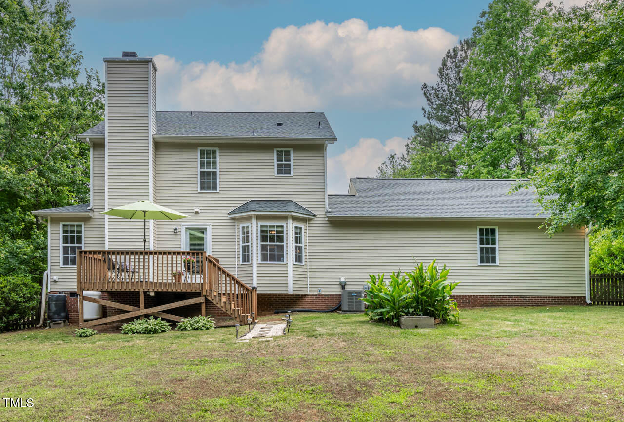 1060 Alderman Circle Raleigh, NC 27603 - Photo 21 of 30 a view of a house with a yard