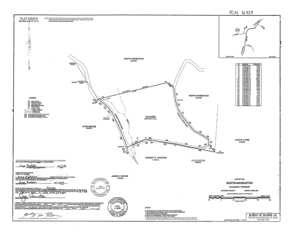 a picture of a room with a white wall and a painting