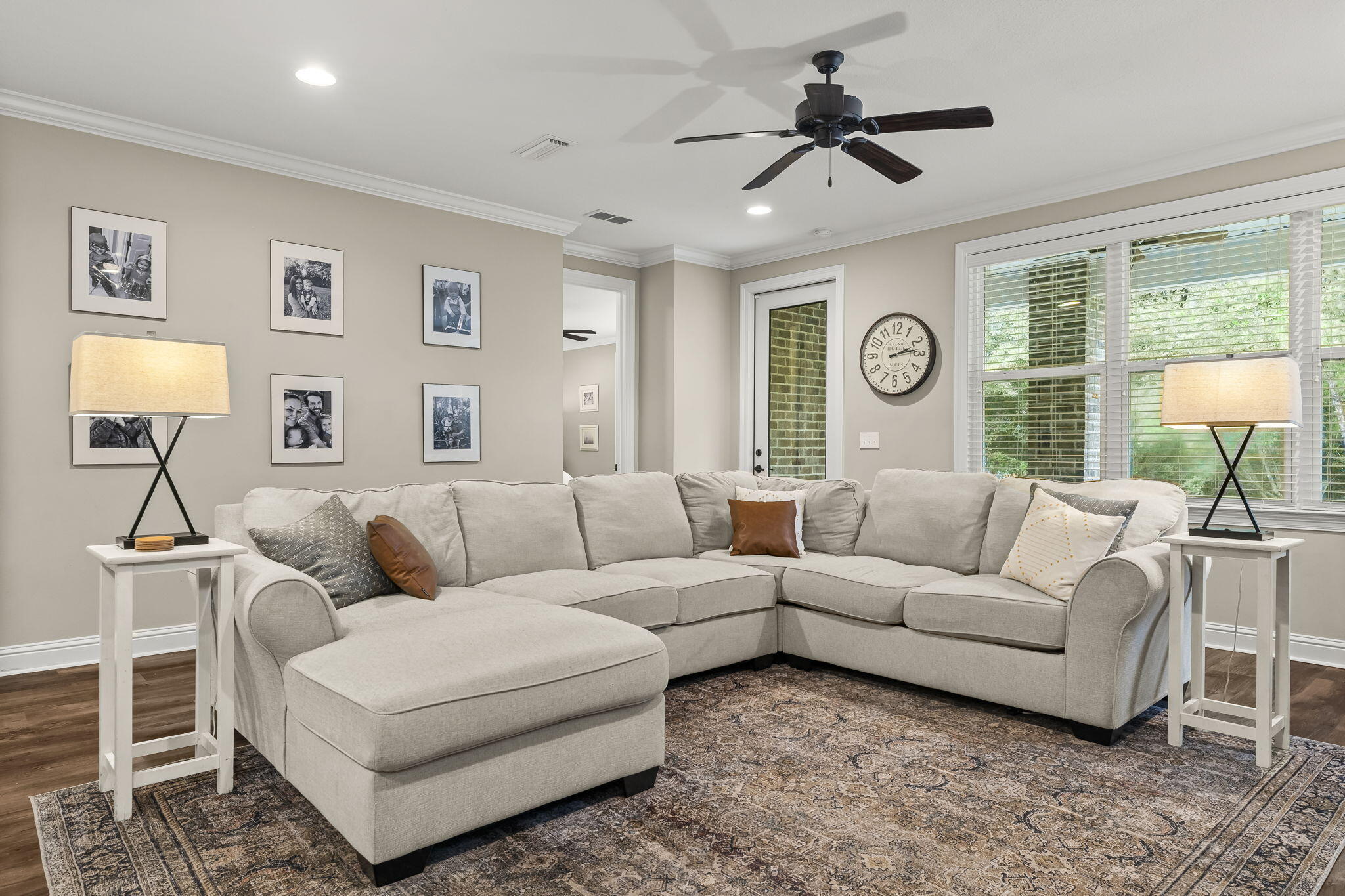 51 Leap Year Lane Freeport, FL 32439 - Photo 26 of 75 a living room with furniture a clock and a large window