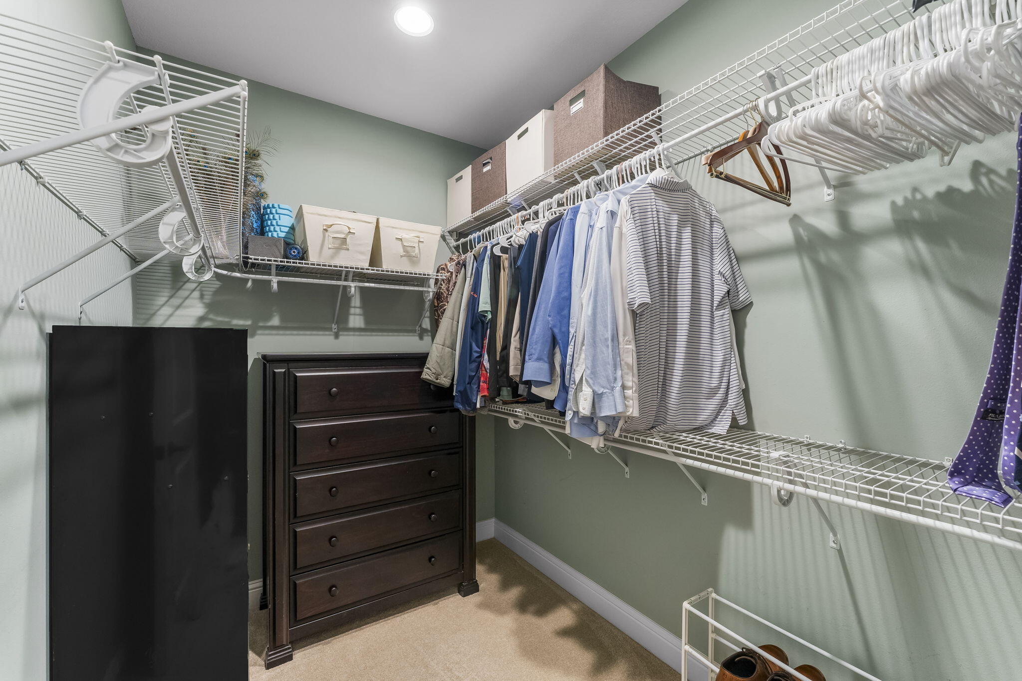 51 Leap Year Lane Freeport, FL 32439 - Photo 31 of 75 a view of walk in closet with clothes and shoes