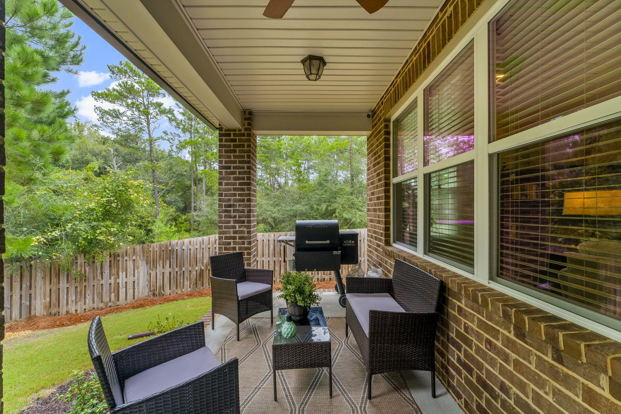 51 Leap Year Lane Freeport, FL 32439 - Photo 37 of 75 a outdoor living space with patio furniture and garden view