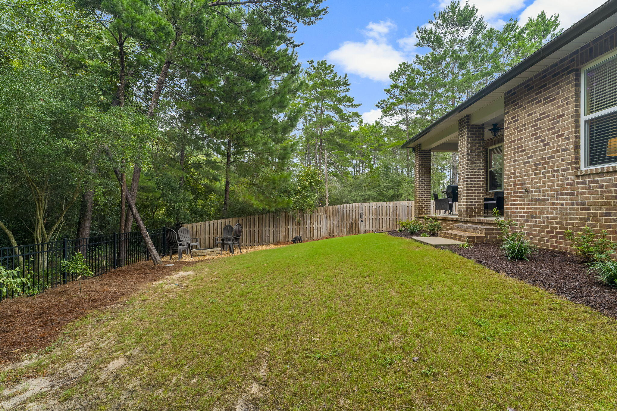 51 Leap Year Lane Freeport, FL 32439 - Photo 38 of 75 a view of backyard with green space