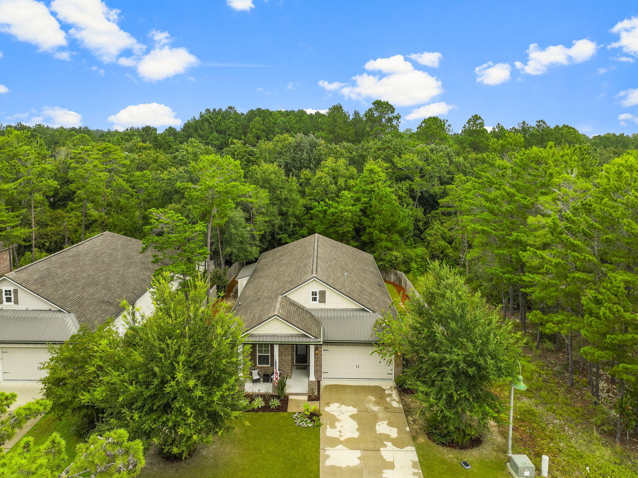 51 Leap Year Lane Freeport, FL 32439 - Photo 5 of 75 a aerial view of a house with a yard and tree s