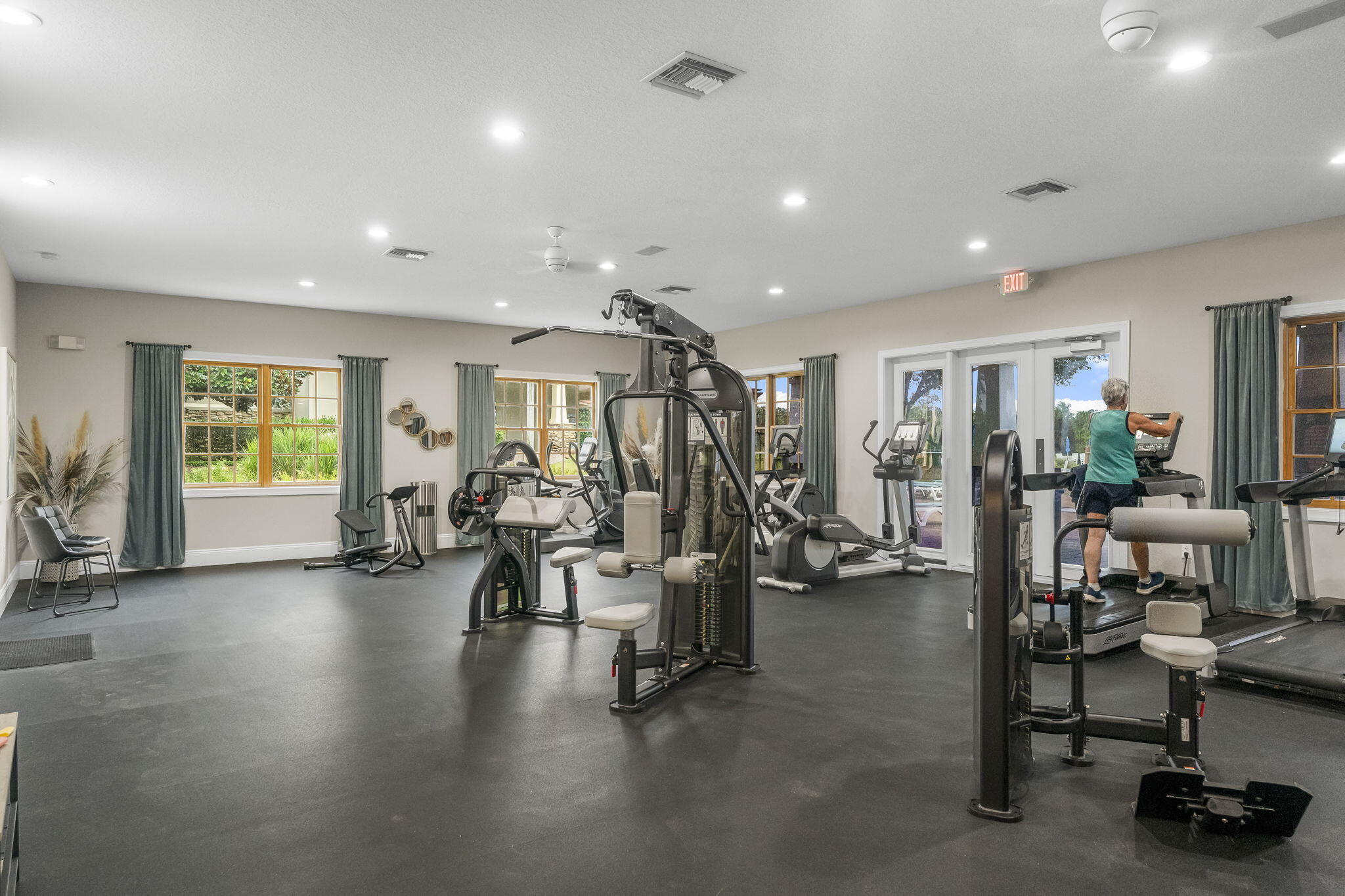 51 Leap Year Lane Freeport, FL 32439 - Photo 68 of 75 a view of a room with gym equipment and a large window
