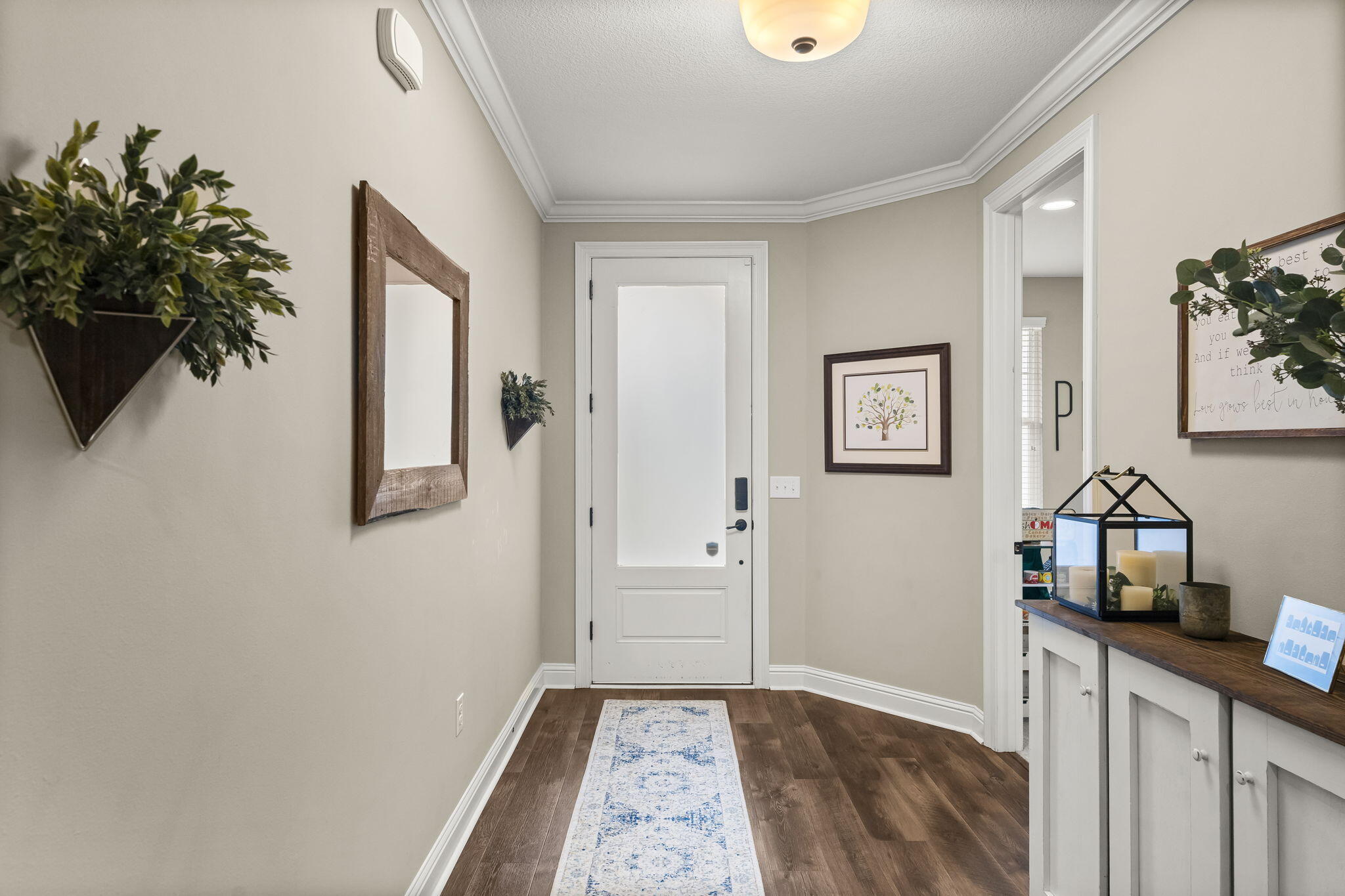 51 Leap Year Lane Freeport, FL 32439 - Photo 7 of 75 a view of a hallway to a livingroom and a window
