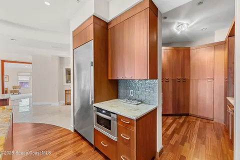 a kitchen with a stove and a sink