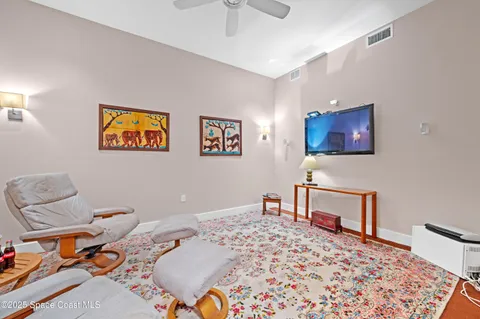 a spacious bedroom with a bed and window