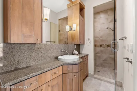 a view of two chairs in the balcony