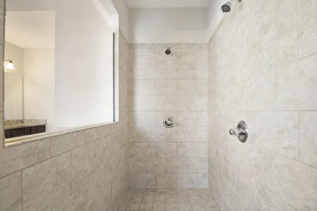 a view of a room with wooden walls