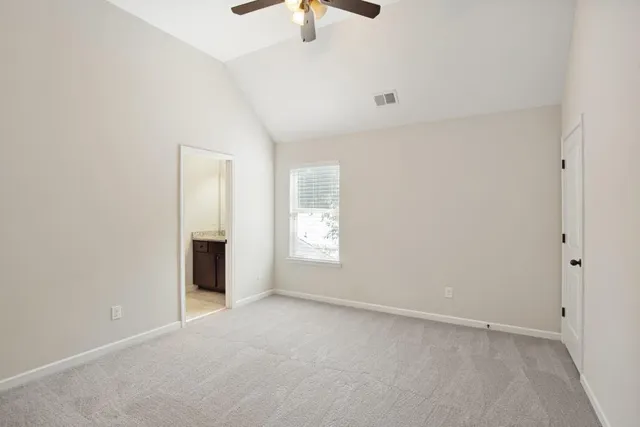 a view of a house with backyard and porch