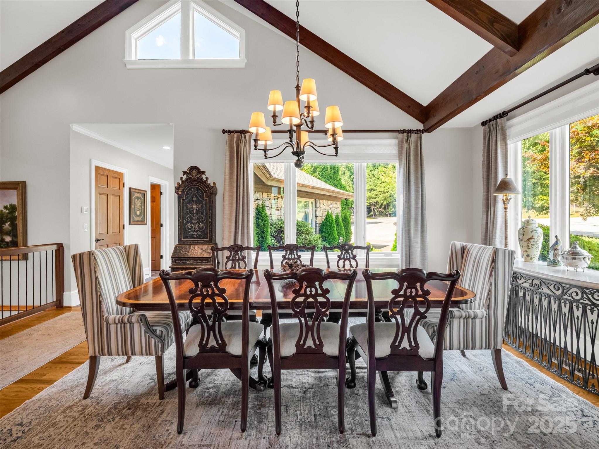 2435 Deep Gap Farm Road East Mill Spring, NC 28756 - Photo 12 of 44 a view of a dining room with furniture window and outside view