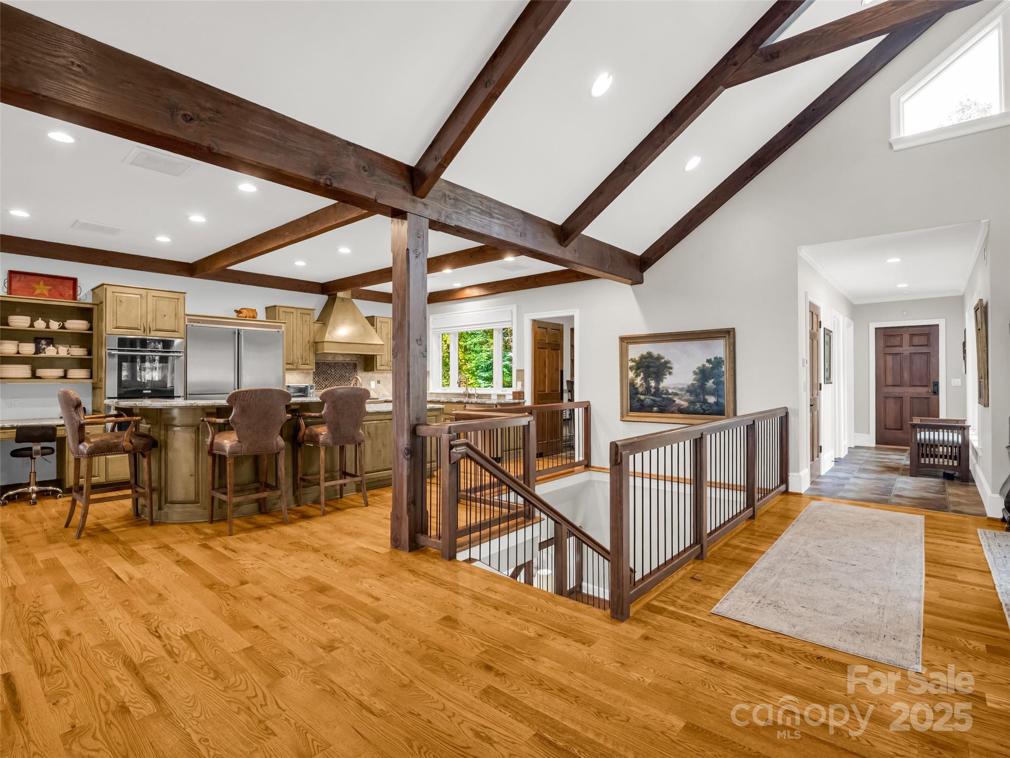 2435 Deep Gap Farm Road East Mill Spring, NC 28756 - Photo 13 of 44 a view of a room with wooden floor