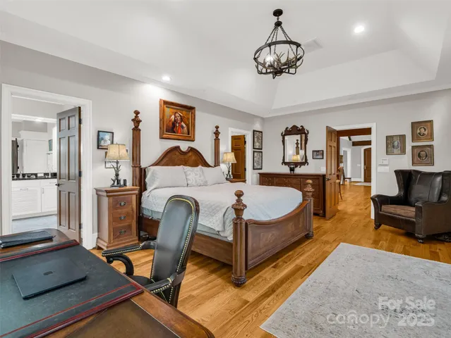 a bathroom with double sink and a large mirror