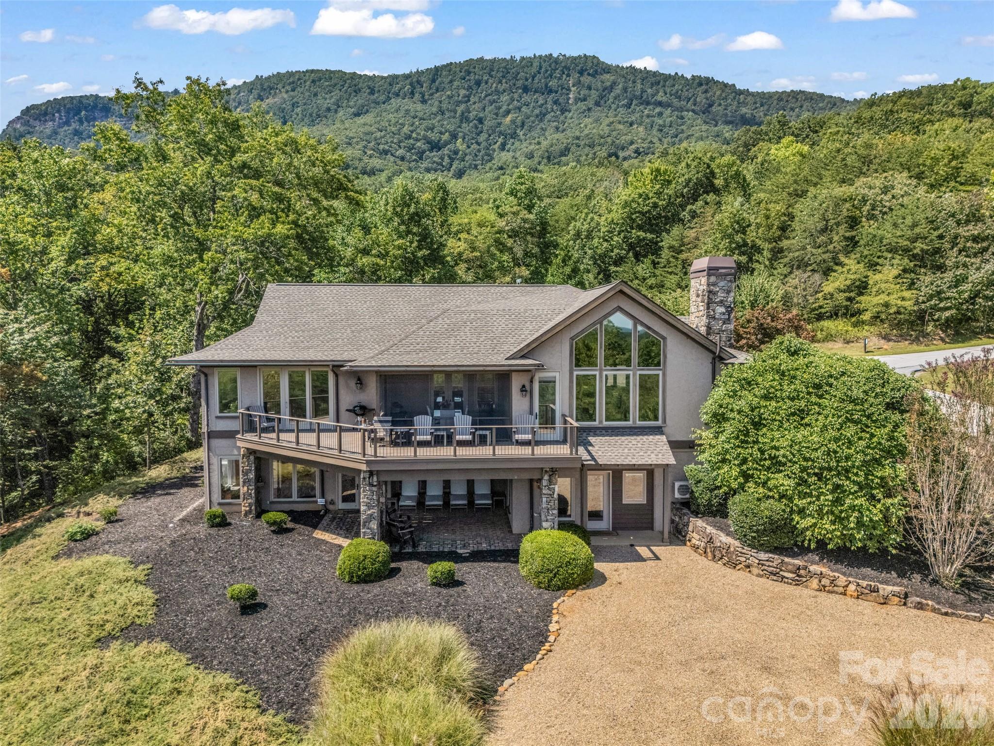 2435 Deep Gap Farm Road East Mill Spring, NC 28756 - Photo 2 of 42 aerial view of a house with a yard