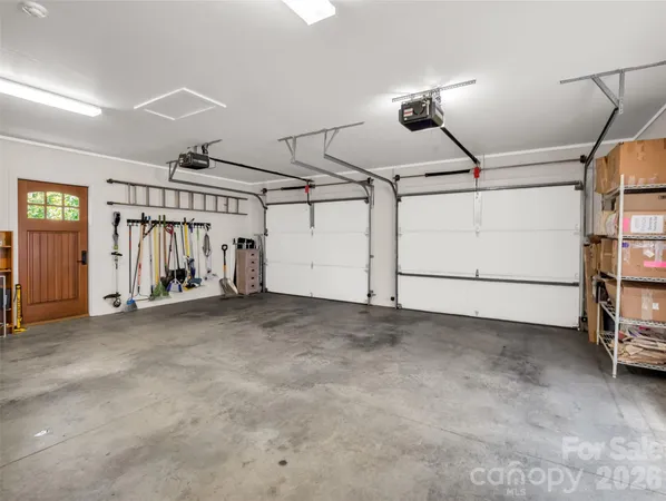 a spacious bathroom with a double vanity sink mirror and double