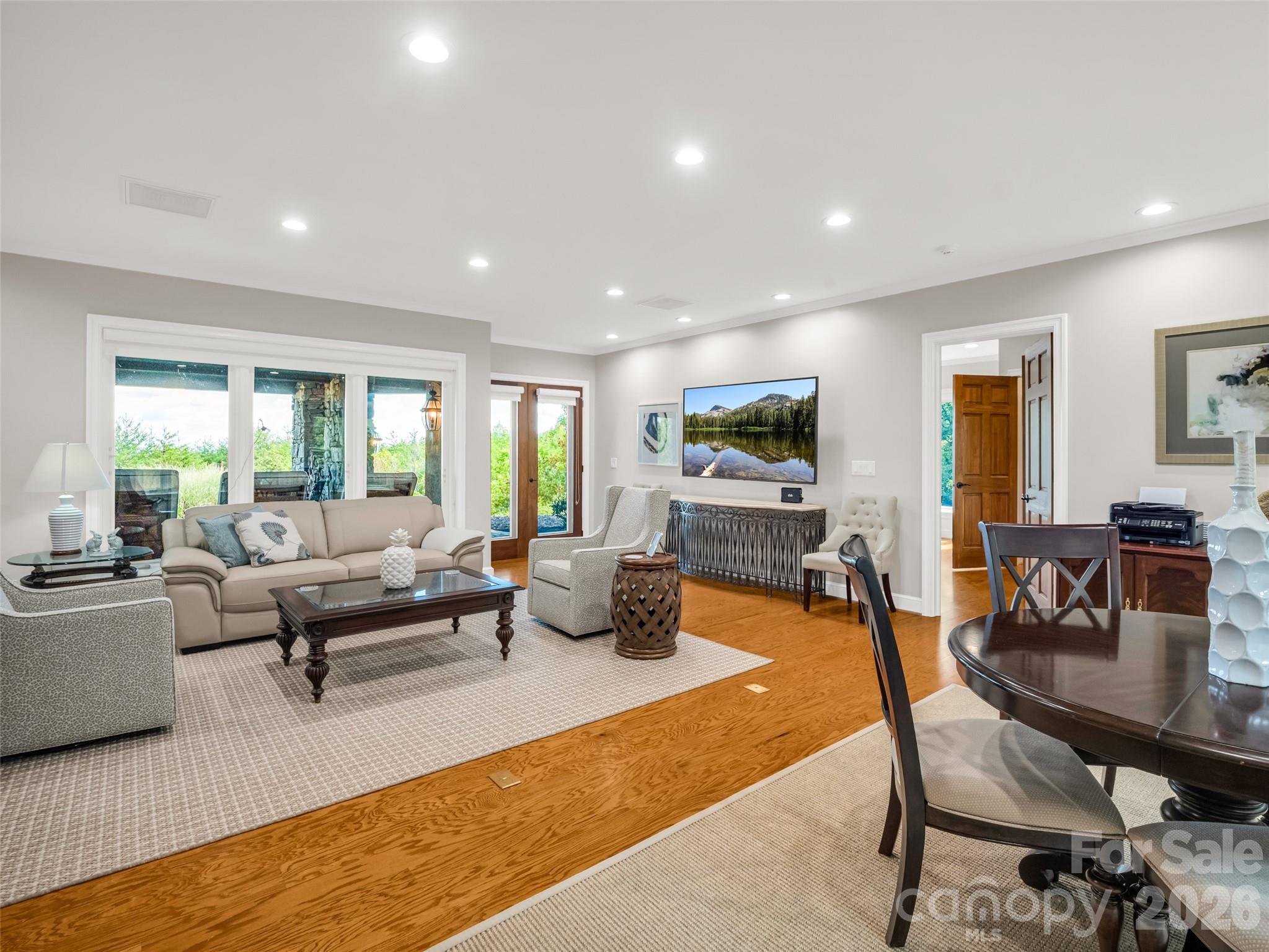 2435 Deep Gap Farm Road East Mill Spring, NC 28756 - Photo 28 of 42 a living room with furniture and a flat screen tv