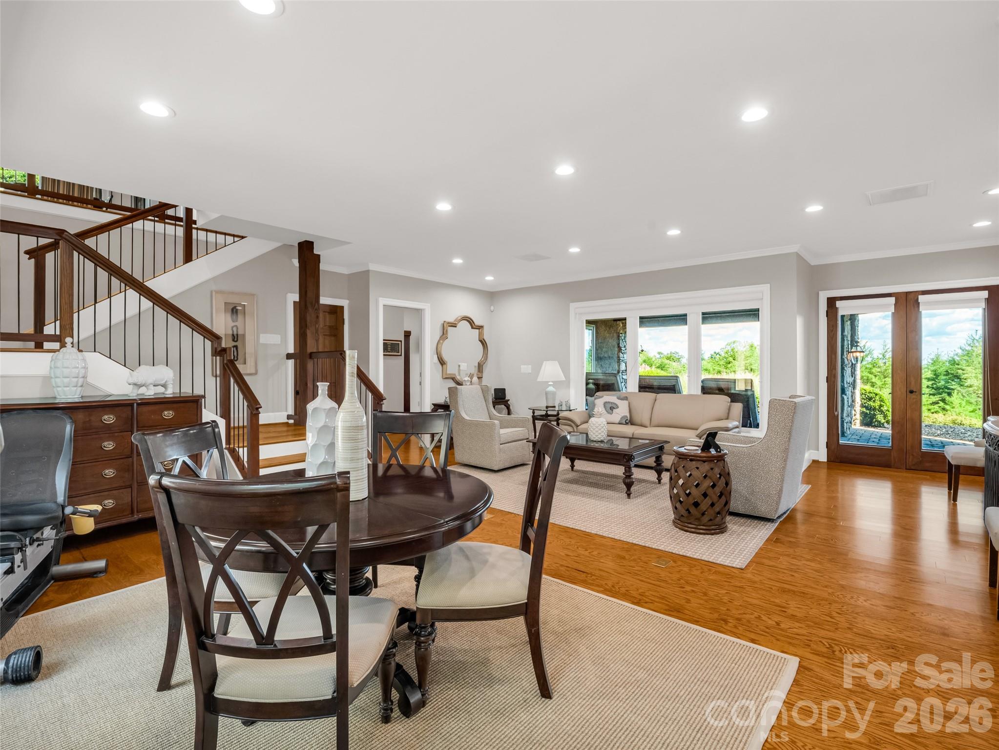 2435 Deep Gap Farm Road East Mill Spring, NC 28756 - Photo 29 of 42 a living room with furniture and a wooden floor