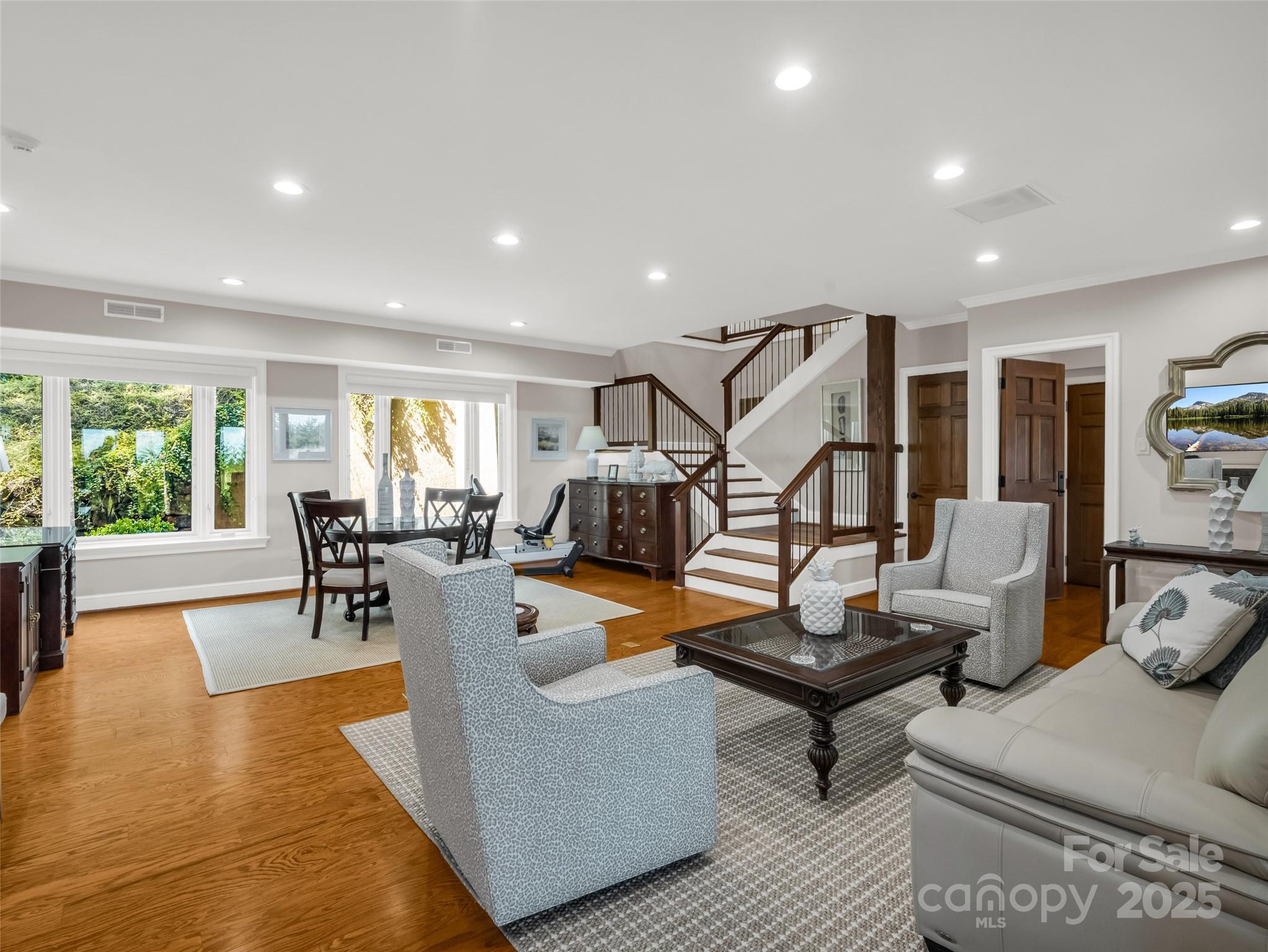 2435 Deep Gap Farm Road East Mill Spring, NC 28756 - Photo 31 of 44 a living room with furniture and a wooden floor
