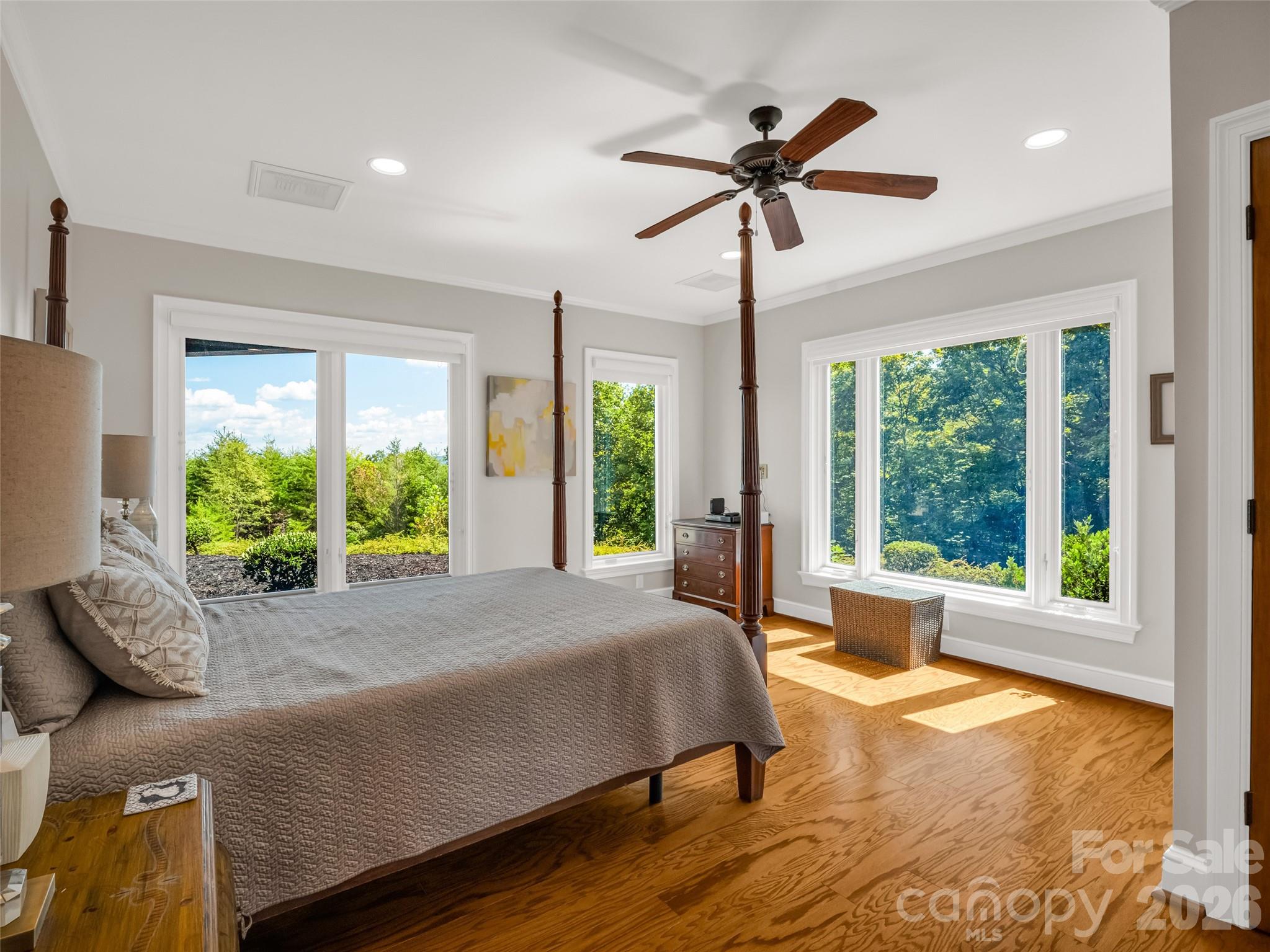2435 Deep Gap Farm Road East Mill Spring, NC 28756 - Photo 31 of 42 a bed sitting in a spacious bedroom next to a window