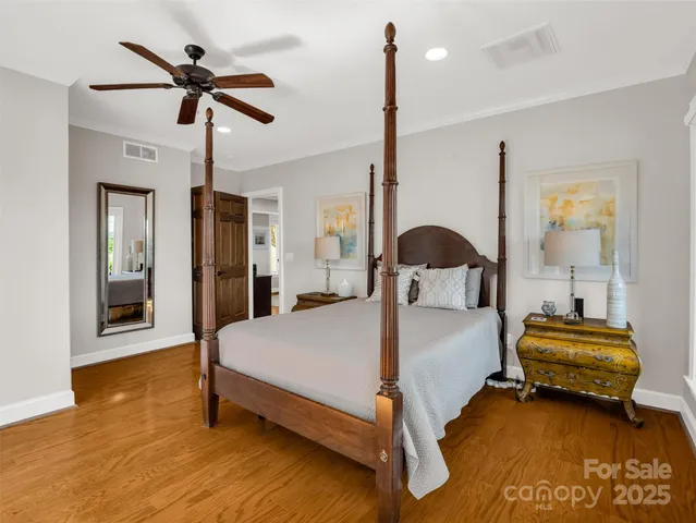 a bathroom with a double vanity sink toilet and shower
