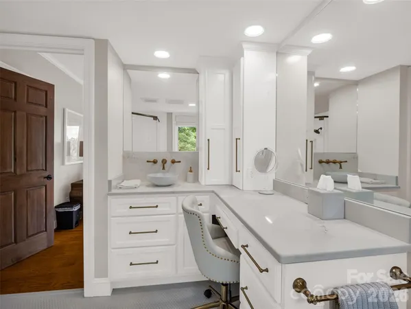 a view of house with outdoor space swimming pool and furniture