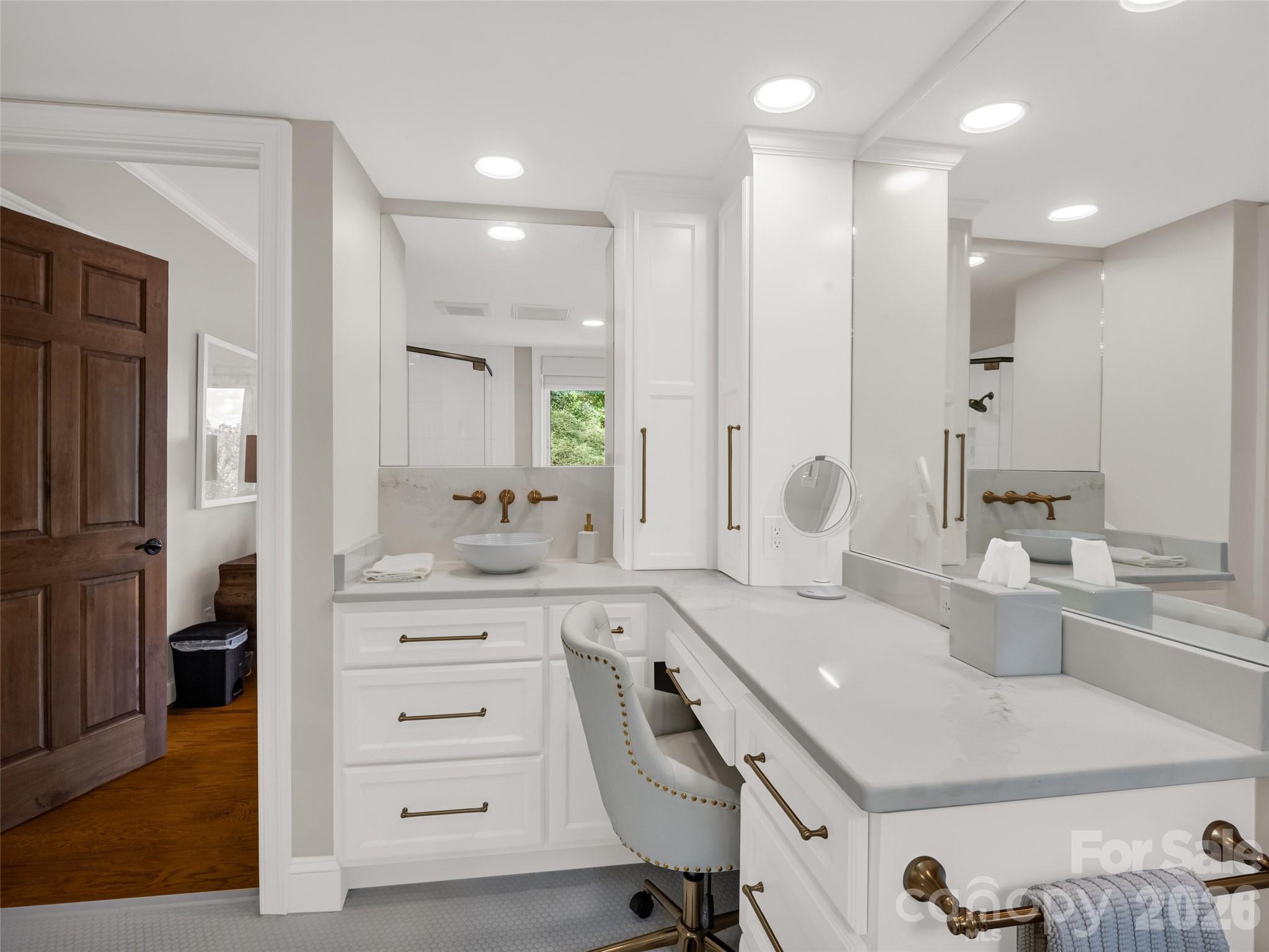 2435 Deep Gap Farm Road East Mill Spring, NC 28756 - Photo 34 of 42 a spacious bathroom with a granite countertop sink mirror and a shower