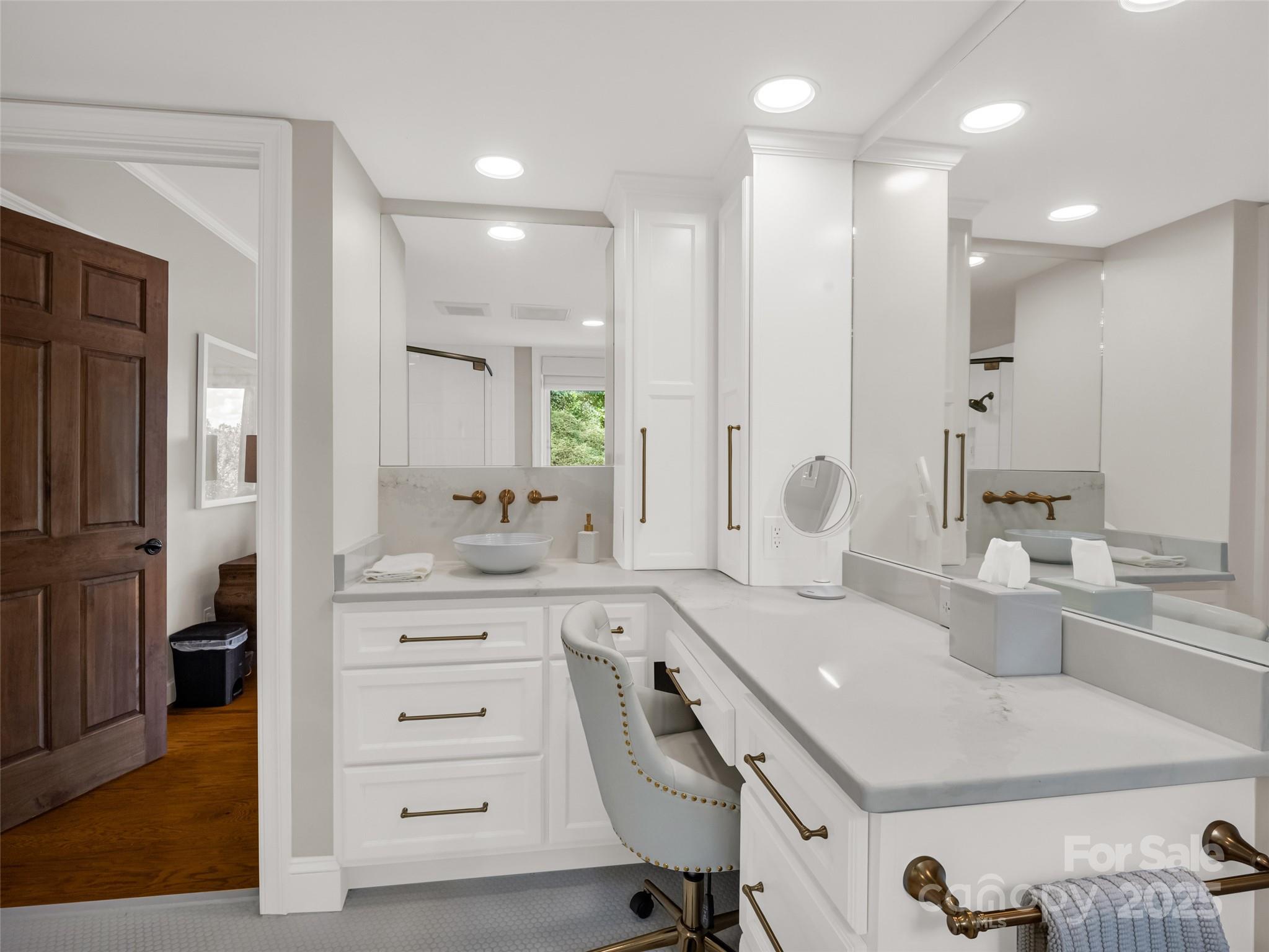 2435 Deep Gap Farm Road East Mill Spring, NC 28756 - Photo 35 of 44 a spacious bathroom with a granite countertop sink mirror and a shower