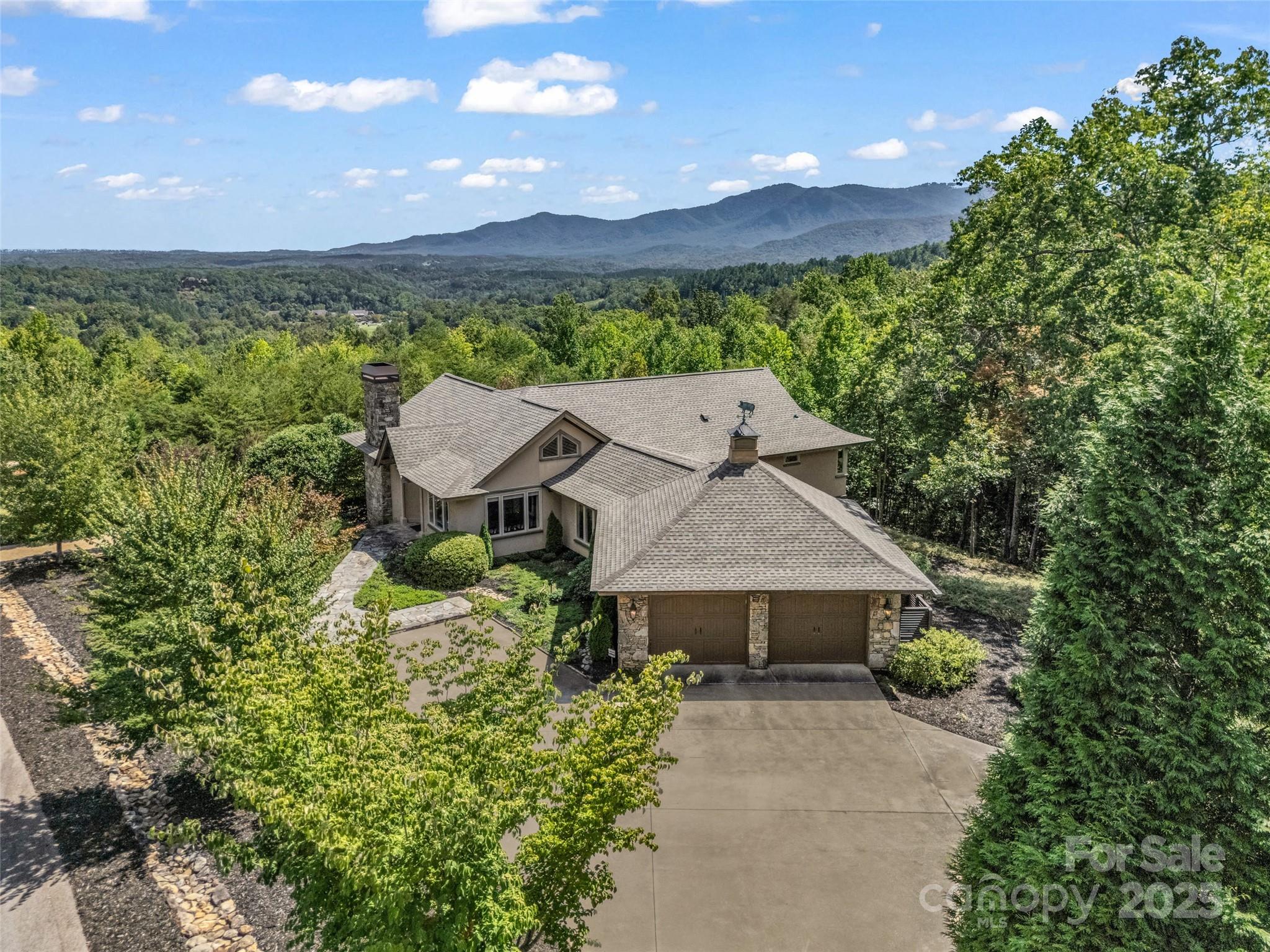 2435 Deep Gap Farm Road East Mill Spring, NC 28756 - Photo 43 of 44 an aerial view of a house