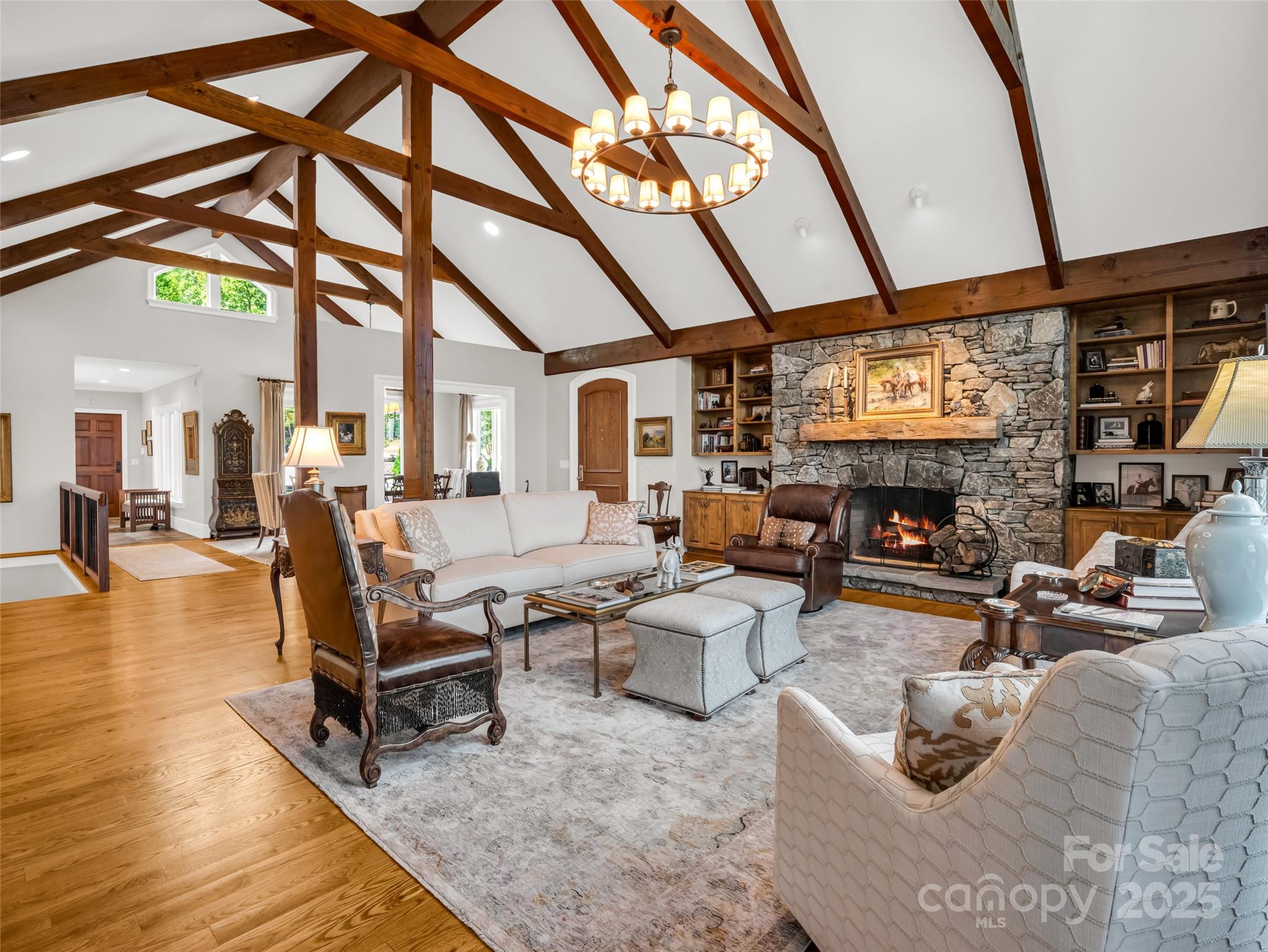 2435 Deep Gap Farm Road East Mill Spring, NC 28756 - Photo 7 of 44 a living room with furniture and a fireplace