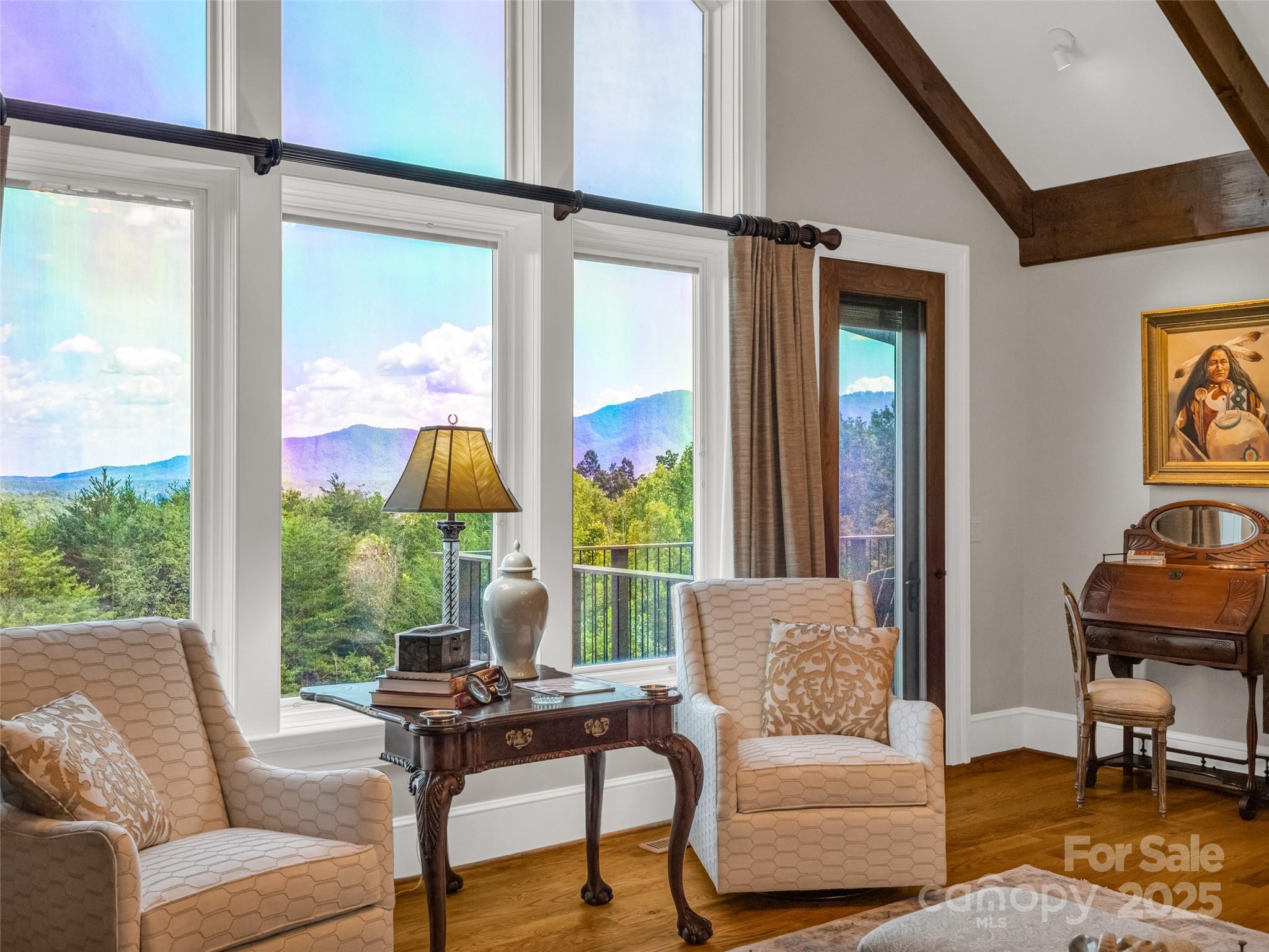 2435 Deep Gap Farm Road East Mill Spring, NC 28756 - Photo 10 of 44 a living room with furniture and a window