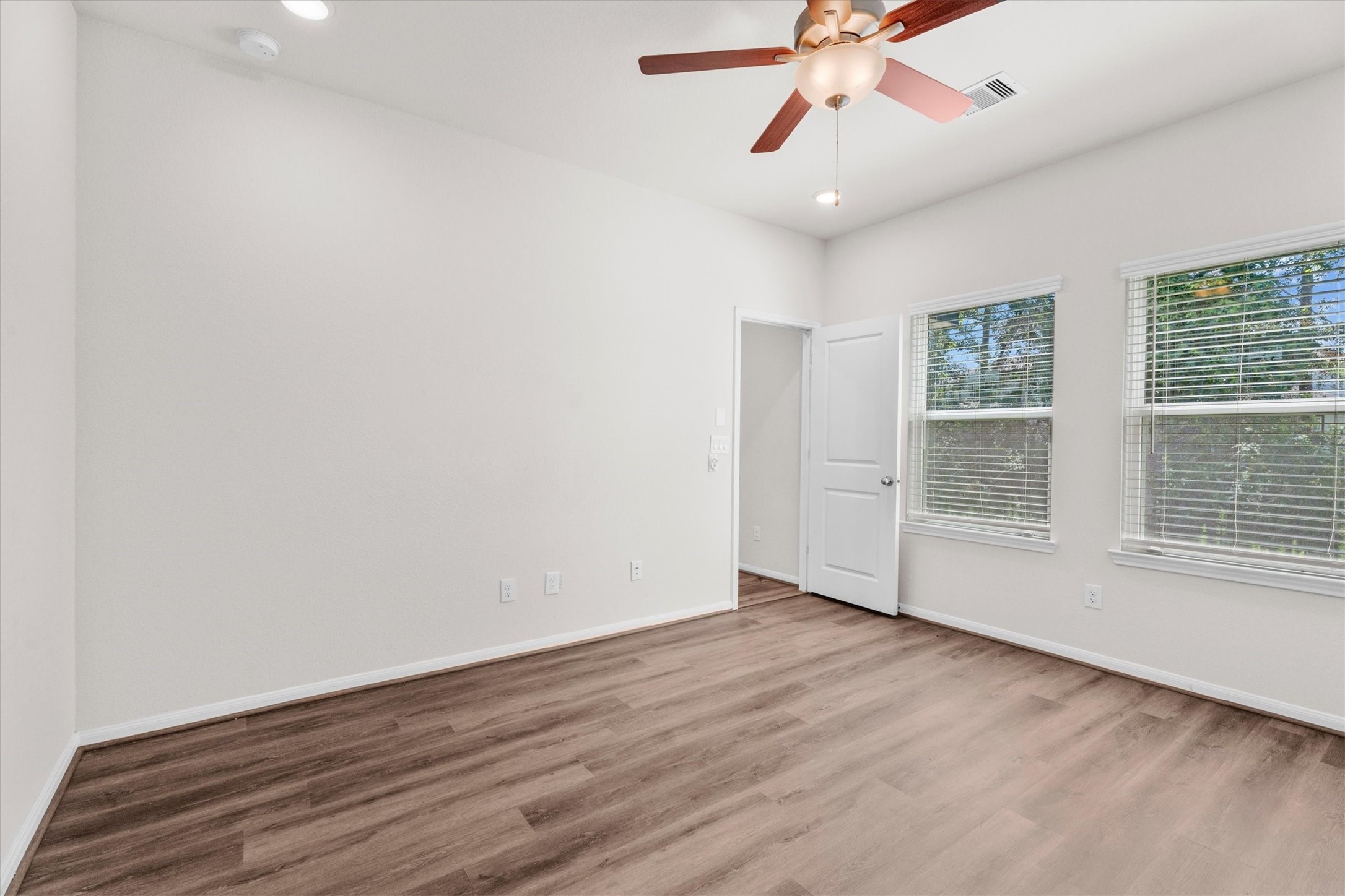 39 Courageous Side Way Magnolia, TX 77354 - Photo 13 of 44 primary bedroom with abundant natural light and flexible furniture layout options