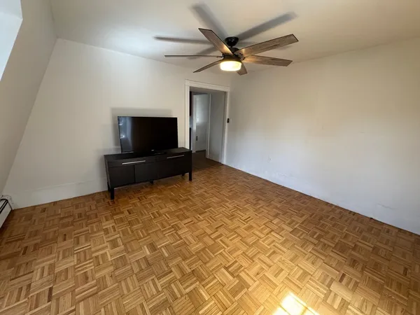 a view of a livingroom with a flat screen tv