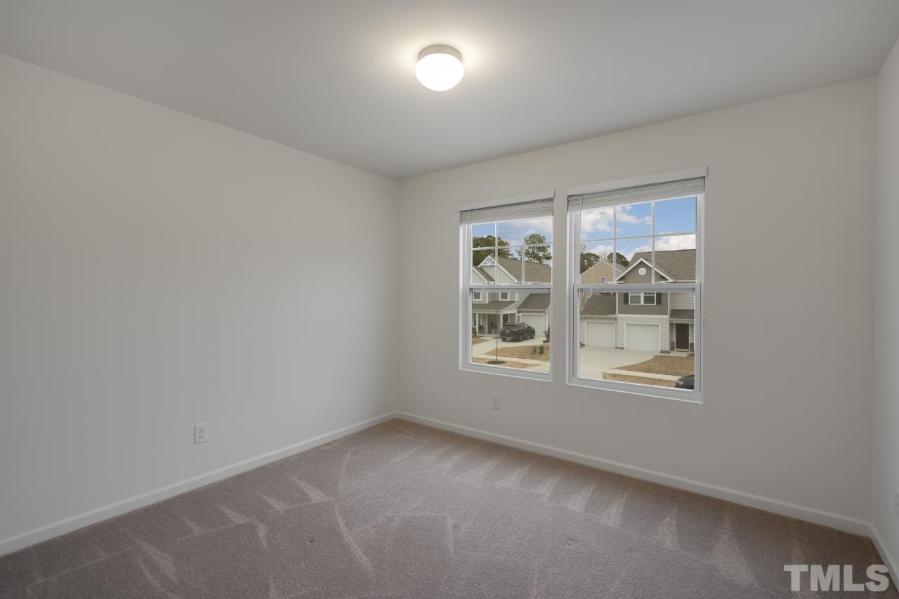 309 Connect Drive Wendell, NC 27591 - Photo 18 of 29 an empty room with a window