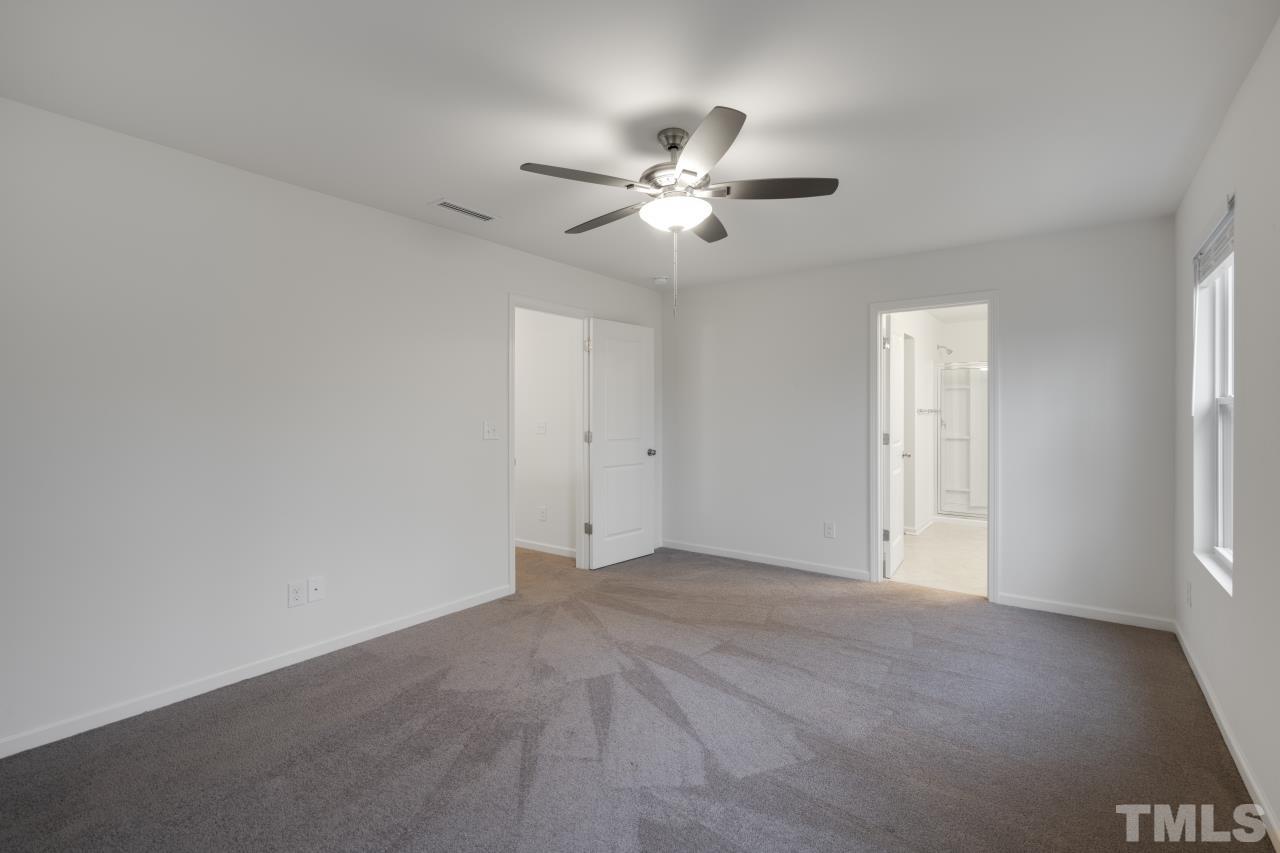 309 Connect Drive Wendell, NC 27591 - Photo 24 of 29 a view of an empty room with a window