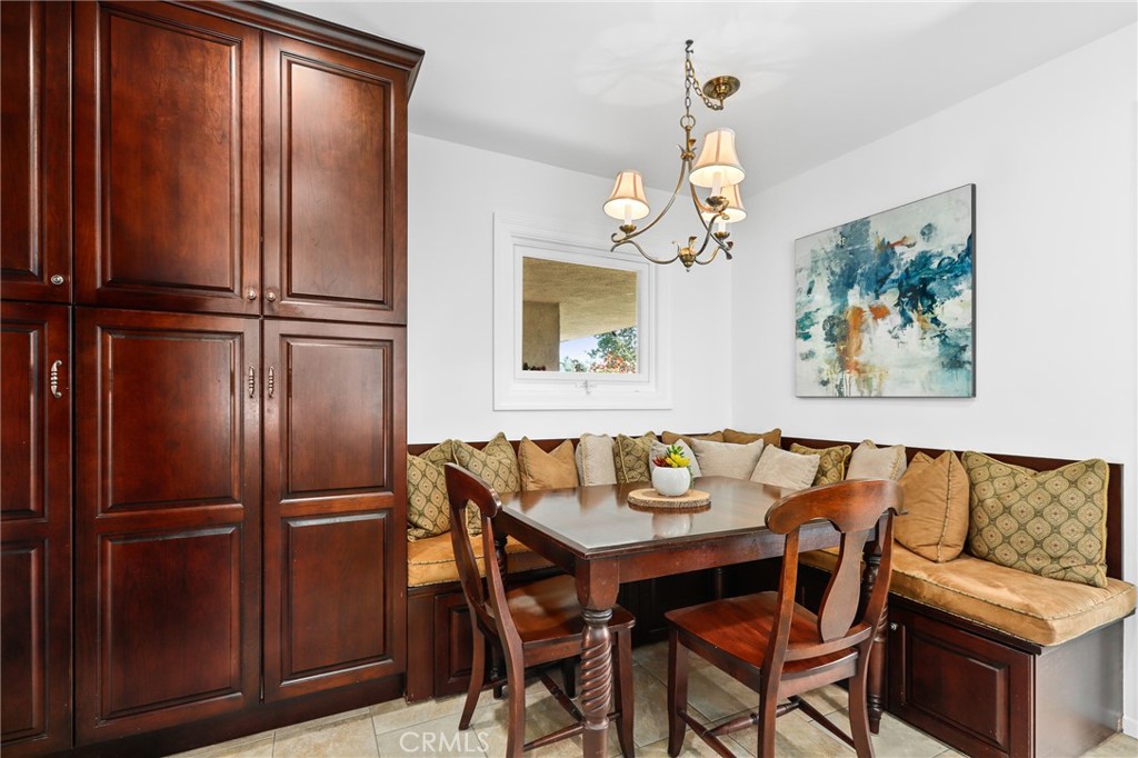 190 Lilac Lane Brea, CA 92823 - Photo 16 of 72 a view of a dining room with furniture window and wooden floor