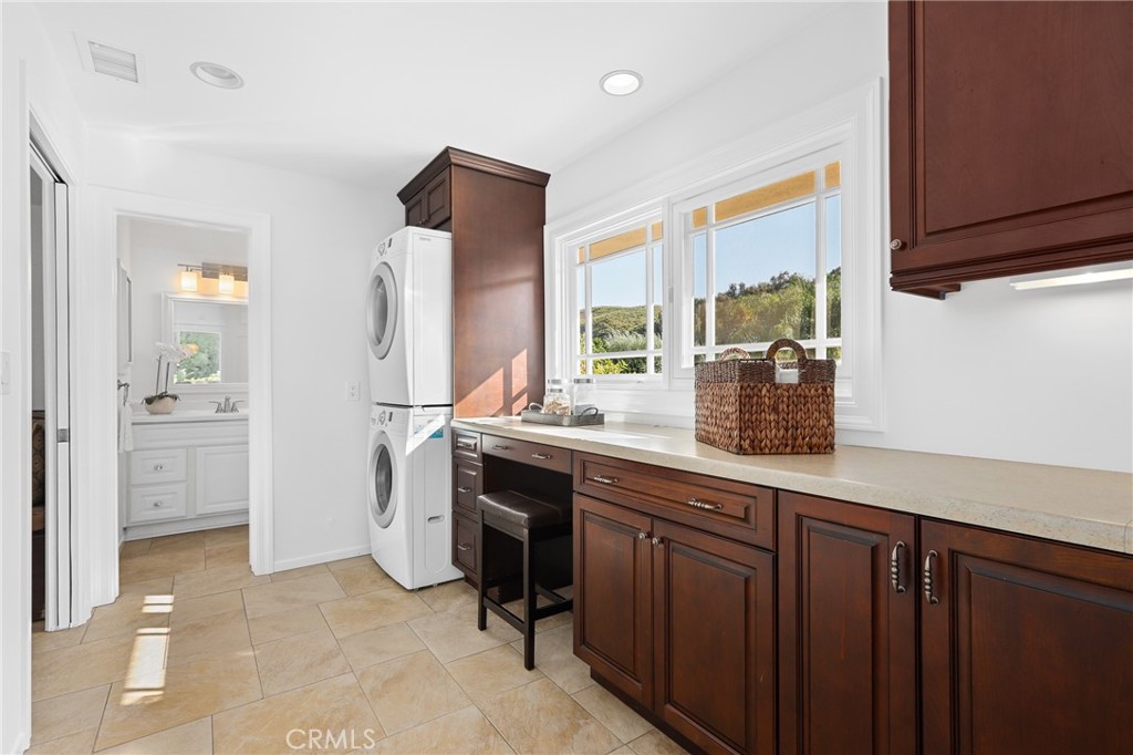 190 Lilac Lane Brea, CA 92823 - Photo 18 of 72 a spacious bathroom with a granite countertop sink mirror and a bathtub