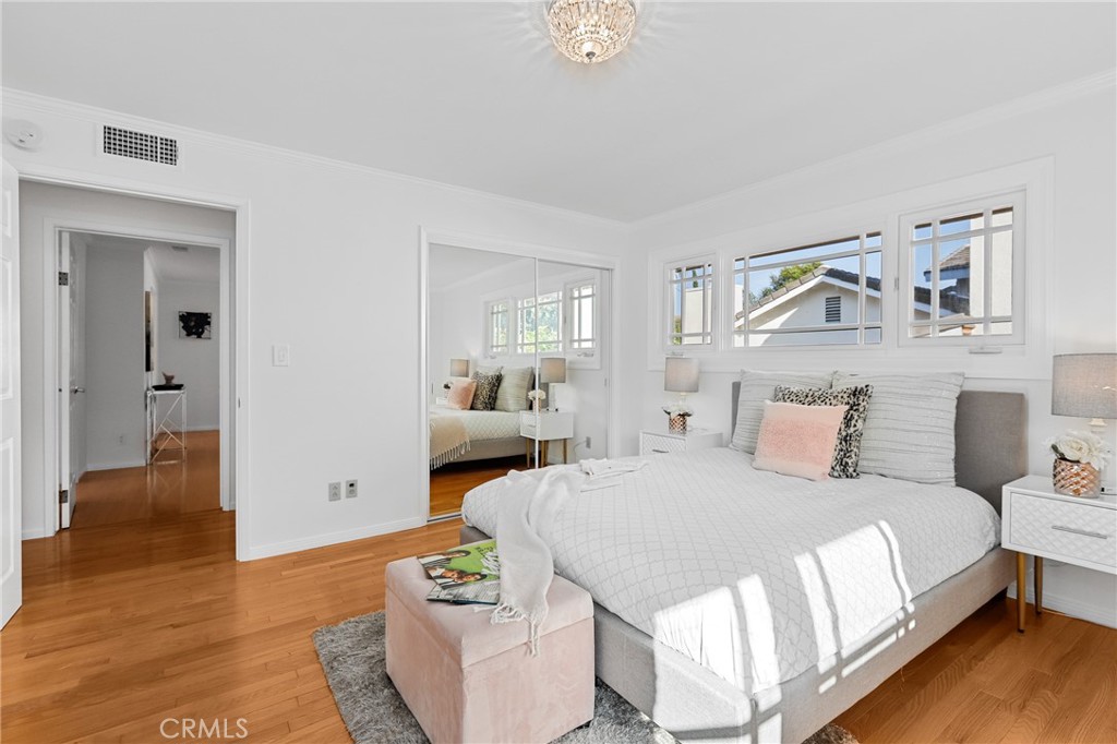 190 Lilac Lane Brea, CA 92823 - Photo 25 of 72 a bedroom with a bed and wooden floor