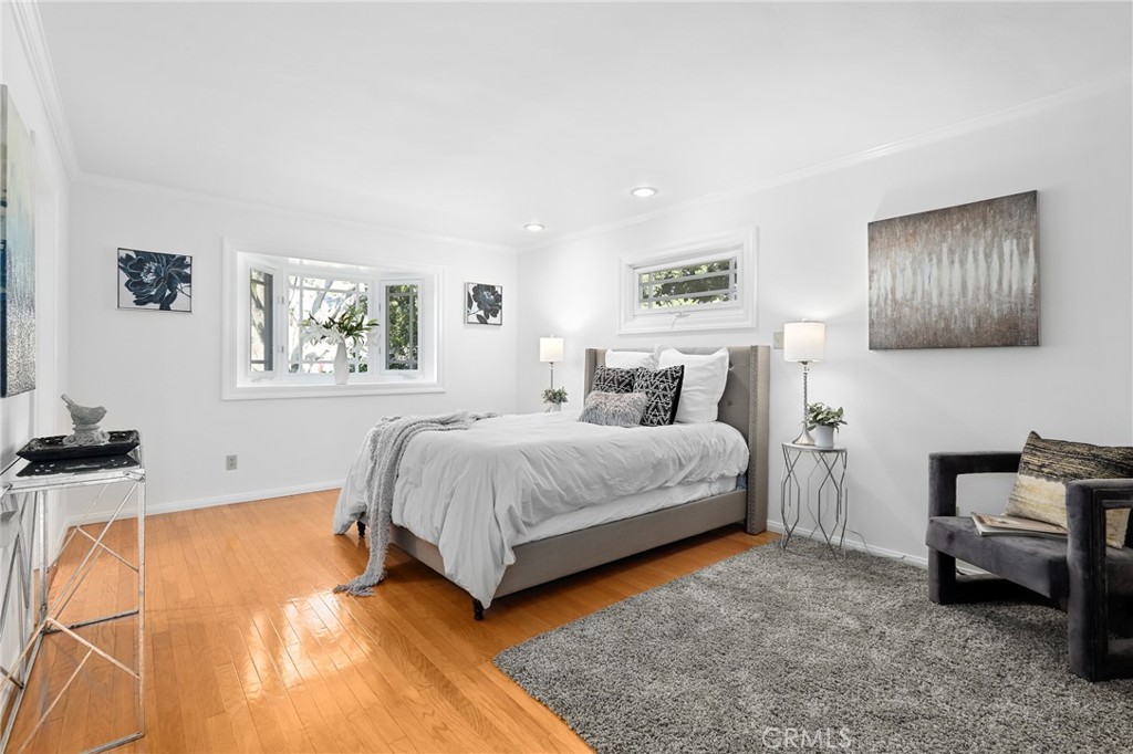 190 Lilac Lane Brea, CA 92823 - Photo 26 of 72 a bedroom with a bed and a night stand