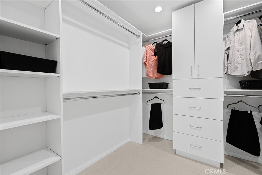 190 Lilac Lane Brea, CA 92823 - Photo 29 of 72 a view of walk in closet with clothes and shoes
