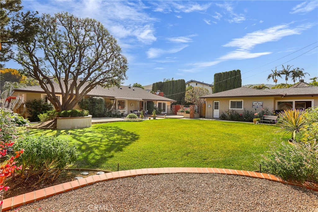 190 Lilac Lane Brea, CA 92823 - Photo 41 of 72 a front view of a house with a garden