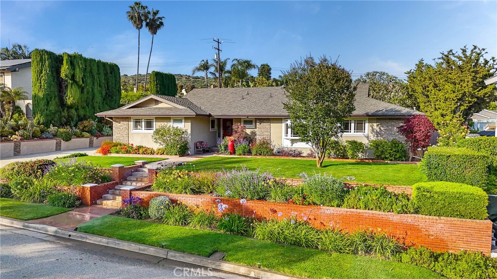 190 Lilac Lane Brea, CA 92823 - Photo 49 of 72 a front view of a house with garden