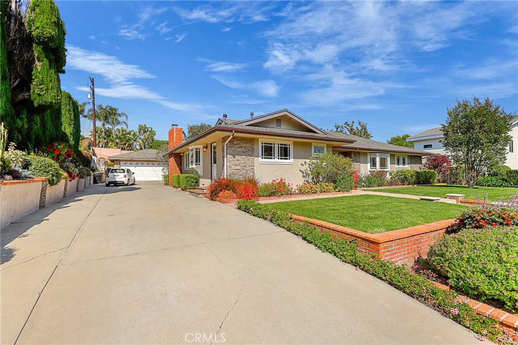 190 Lilac Lane Brea, CA 92823 - Photo 51 of 72 a front view of a house with a yard