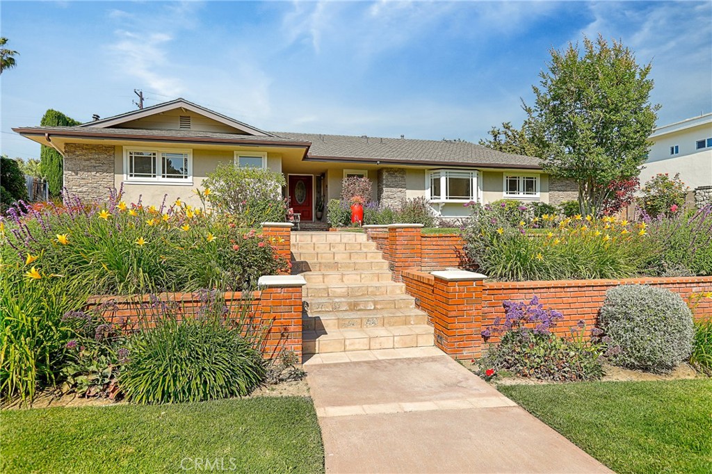 190 Lilac Lane Brea, CA 92823 - Photo 52 of 72 a front view of a house with a yard