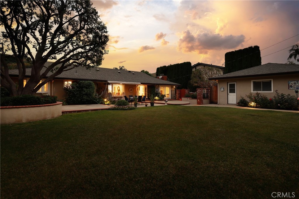 190 Lilac Lane Brea, CA 92823 - Photo 69 of 72 a front view of a house with a garden