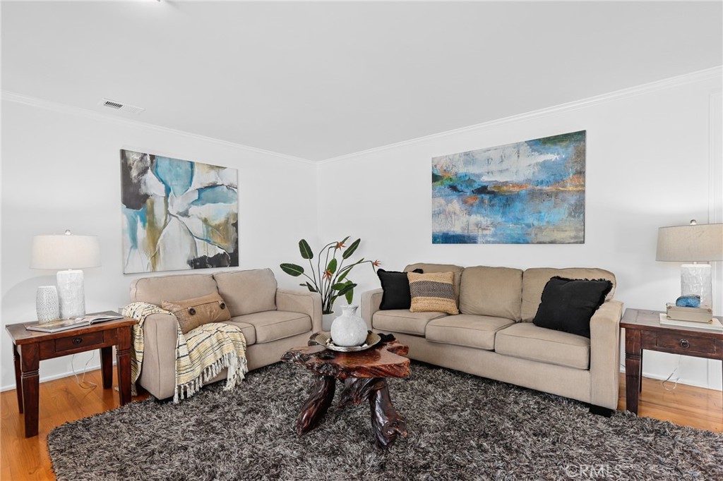 190 Lilac Lane Brea, CA 92823 - Photo 8 of 72 a living room with furniture two couch and a painting on the wall