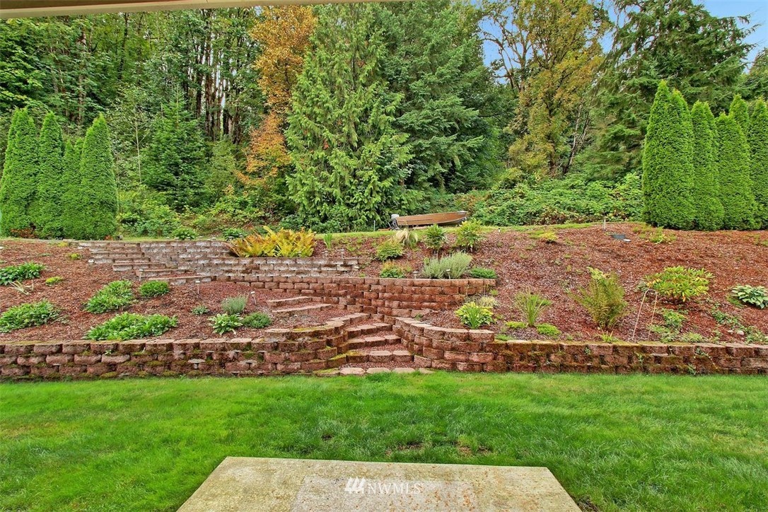 11225 Renton Issaquah Road Southeast Issaquah, WA 98027 - Photo 21 of 21 a view of a yard with plants
