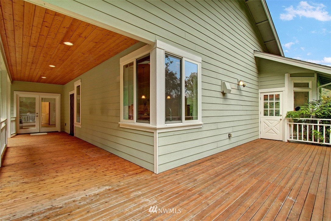 11225 Renton Issaquah Road Southeast Issaquah, WA 98027 - Photo 10 of 21 a view of a house with wooden deck