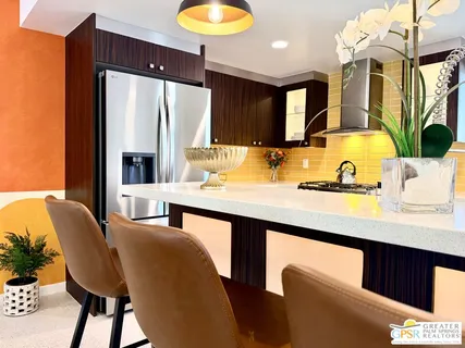 a workspace with furniture and a wooden floor