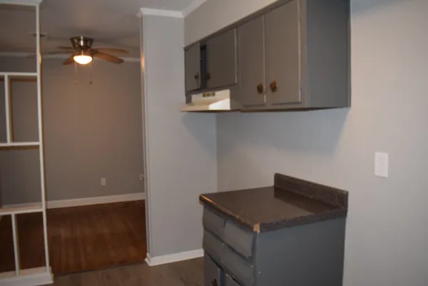 a utility room with cabinets